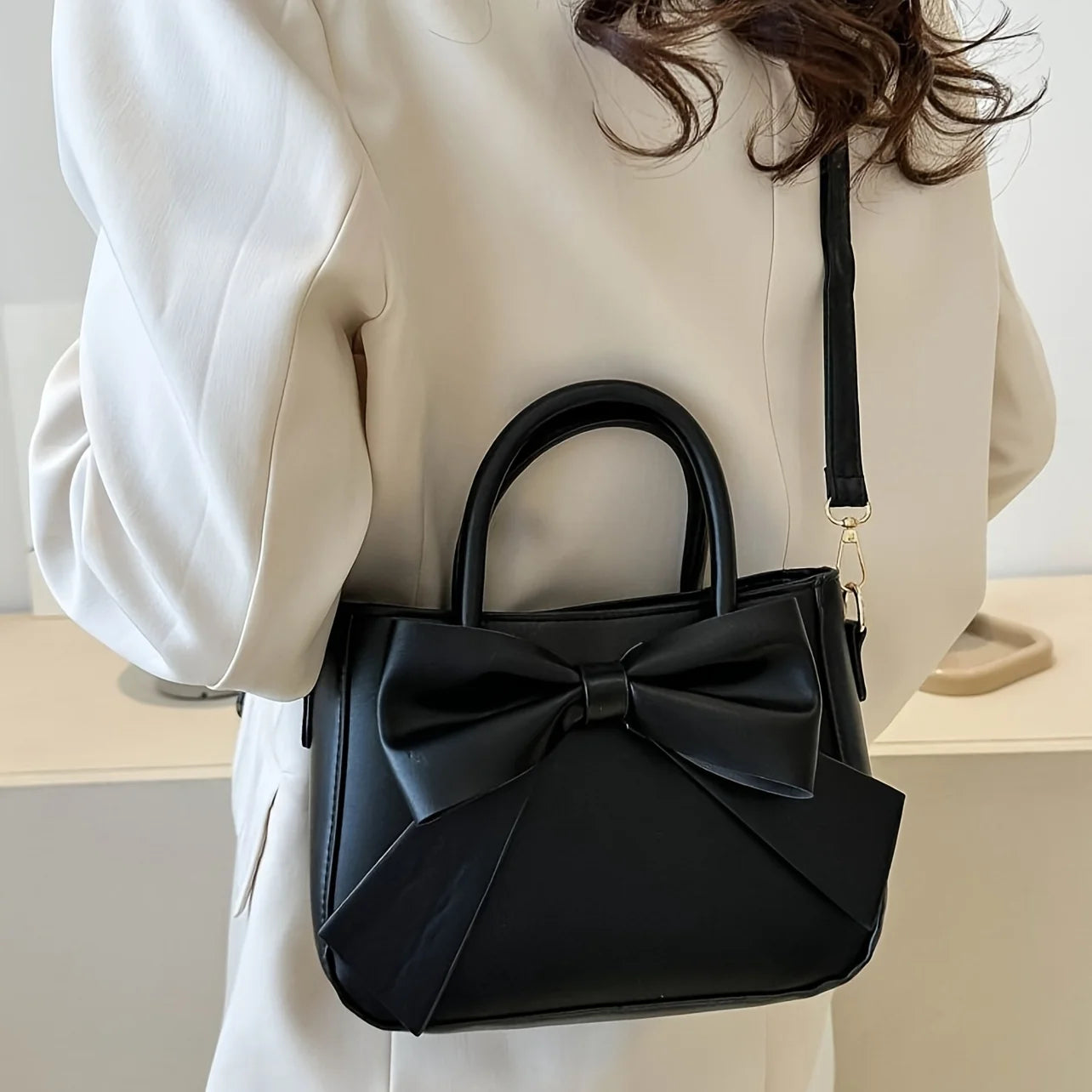 Elegant Black Bow Handbag w/ Gold Hardware, Detachable Strap.Versatile for Daily Use & Formal Events.Fashion Must-Have!Shop Now!